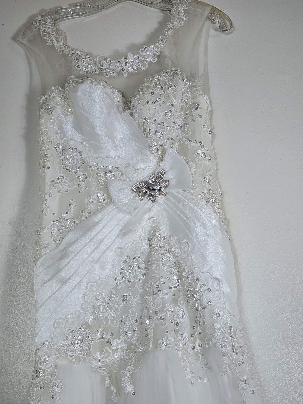 White Embellished Wedding Dress with Floral Lace and Bow Accent